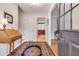 Bright foyer featuring hardwood floors, white walls, and a glimpse of the kitchen at 1631 Manhasset Dr, Atlanta, GA 30338