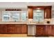 Updated kitchen features granite countertops, stainless steel appliances, and ample cabinet space at 1631 Manhasset Dr, Atlanta, GA 30338