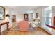 Open-concept living room featuring hardwood floors, lots of natural light, and classic furnishings at 1631 Manhasset Dr, Atlanta, GA 30338