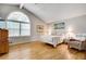 Spacious main bedroom with vaulted ceilings, hardwood floors, and lots of light at 1631 Manhasset Dr, Atlanta, GA 30338