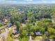 Neighborhood aerial view of homes nestled among mature trees and lush greenery at 1737 Briarlake Cir, Decatur, GA 30033