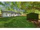 Picturesque backyard showing the home's exterior, shed, and privacy fence at 1737 Briarlake Cir, Decatur, GA 30033