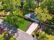 Charming ranch home featuring a gray roof, green lawn, and well-manicured landscaping at 1737 Briarlake Cir, Decatur, GA 30033