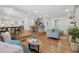 Open concept living room with hardwood floors, an eat-in kitchen and a cozy seating area at 1737 Briarlake Cir, Decatur, GA 30033