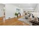 Open-concept living room featuring gleaming hardwood floors, modern decor, and an airy atmosphere at 1737 Briarlake Cir, Decatur, GA 30033