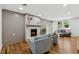 Cozy living room with a brick fireplace, wainscoting, and comfortable seating at 1737 Briarlake Cir, Decatur, GA 30033