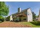 Expansive backyard featuring a deck, lush greenery, and ample space for outdoor enjoyment and relaxation at 3140 Ennfield Ln, Duluth, GA 30096