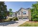 Beautiful home featuring a 2-car garage, landscaped front yard, and classic architectural details for a suburban lifestyle at 3140 Ennfield Ln, Duluth, GA 30096