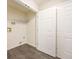 Functional laundry room with tile flooring and closet provides convenience and extra storage at 3140 Ennfield Ln, Duluth, GA 30096