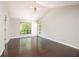 Bright main bedroom features wood floors, vaulted ceiling, and natural light at 3140 Ennfield Ln, Duluth, GA 30096