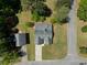An aerial view of a well-maintained property with a lush green lawn in a quiet neighborhood at 7171 Hazelwood Dr, Jonesboro, GA 30236