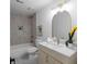 Modern bathroom featuring a bathtub, new vanity, and stylish fixtures at 7171 Hazelwood Dr, Jonesboro, GA 30236