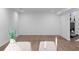 Bright living room features neutral paint, light colored floors, and a modern fireplace at 7171 Hazelwood Dr, Jonesboro, GA 30236