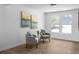 Cozy sitting room with hardwood floors, natural light, and modern decor at 7171 Hazelwood Dr, Jonesboro, GA 30236