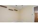 Bright bedroom with floating shelves and ceiling fan at 127 Stoney Creek Pkwy, Woodstock, GA 30188