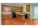 Gourmet kitchen with granite countertops, stainless steel appliances, and a functional center island at 127 Stoney Creek Pkwy, Woodstock, GA 30188