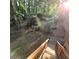 Enjoy this backyard, with lush greenery and an open play area, creating a private outdoor retreat for relaxation and recreation at 1901 Arnold Dr, Austell, GA 30106