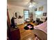 Cozy bedroom with hardwood floors, natural light, and ceiling fan at 1901 Arnold Dr, Austell, GA 30106