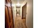 Bright hallway with beautiful hardwood floors and classic design at 1901 Arnold Dr, Austell, GA 30106