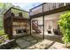 Backyard with a multi-level deck, a swing, and a patio, perfect for outdoor entertaining at 350 Covered Bridge Sw Pl, Smyrna, GA 30082