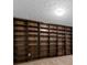 Large built-in wooden shelves in the basement at 350 Covered Bridge Sw Pl, Smyrna, GA 30082
