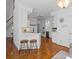 Kitchen featuring stainless appliances, a breakfast bar, and an open layout at 350 Covered Bridge Sw Pl, Smyrna, GA 30082
