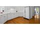 Well-appointed kitchen featuring white cabinets and stainless steel appliances at 350 Covered Bridge Sw Pl, Smyrna, GA 30082