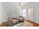 Comfortable sitting area with two chairs, large windows, and natural light at 350 Covered Bridge Sw Pl, Smyrna, GA 30082
