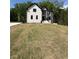 Beautiful new home with a stone and white brick front on a large landscaped lot at 409 Saint Surrey Way, Ellenwood, GA 30294