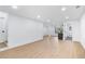 Open basement featuring recessed lighting, light flooring, and easy access to a full bathroom and storage at 4100 Devon Wood Ne Dr, Marietta, GA 30066