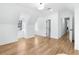 Bright bedroom featuring light wood flooring, recessed lighting, and two windows that provide natural light at 4100 Devon Wood Ne Dr, Marietta, GA 30066