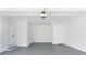 Clean, spacious garage featuring an automatic door opener, epoxy floors, and ample storage at 4100 Devon Wood Ne Dr, Marietta, GA 30066
