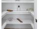 Well-organized walk-in pantry with custom shelving, providing ample storage space at 4100 Devon Wood Ne Dr, Marietta, GA 30066