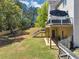 Spacious backyard with deck, covered patio, and playground, great for outdoor activities at 829 Verdun Way, Marietta, GA 30064