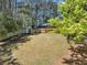 Large backyard featuring a shed and wooden fence, provides privacy and storage at 829 Verdun Way, Marietta, GA 30064