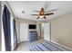Bedroom features ceiling fan, grey dresser, and wood-look floors at 829 Verdun Way, Marietta, GA 30064
