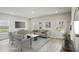 Virtually staged living room with stylish furniture and ample natural light at 1280 Firefly Field Trce, Lawrenceville, GA 30045