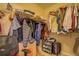 Walk-in closet with wire shelving and hanging clothes at 1670 Cooper Lakes Dr, Grayson, GA 30017