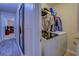 Laundry room with washer, dryer, and shelving for storage at 1670 Cooper Lakes Dr, Grayson, GA 30017