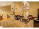 Spacious living room with high ceilings, leather furniture, and large windows at 1670 Cooper Lakes Dr, Grayson, GA 30017