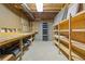 Unfinished basement with built-in shelving at 1750 Providence Place Dr, Alpharetta, GA 30009