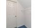 A walk-in closet showcasing a white door, wire shelving, and ample storage space for clothing and accessories at 1750 Providence Place Dr, Alpharetta, GA 30009