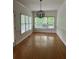 Dining room with lots of natural light and wood floors at 1750 Providence Place Dr, Alpharetta, GA 30009