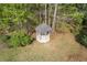 Aerial view of a wooden gazebo on a private, wooded lot with mature trees and landscaping at 1750 Providence Place Dr, Alpharetta, GA 30009