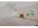 Sun-filled living room features a brick fireplace and large windows at 1750 Providence Place Dr, Alpharetta, GA 30009