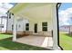 Exterior view of the covered back patio and fenced yard at 241 Martin Spring Rd, Lawrenceville, GA 30045