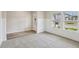 Comfortable living space with soft carpet, bright windows, and neutral decor providing a cozy environment at 241 Martin Spring Rd, Lawrenceville, GA 30045