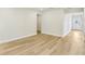 Bright and airy living room featuring pristine white walls, light wood flooring, and a welcoming atmosphere at 241 Martin Spring Rd, Lawrenceville, GA 30045