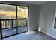 Bedroom with sliding glass doors to deck and durable vinyl flooring at 106 Evergreen Trl, Cartersville, GA 30121