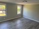 Bright bedroom with two windows and durable vinyl flooring at 106 Evergreen Trl, Cartersville, GA 30121